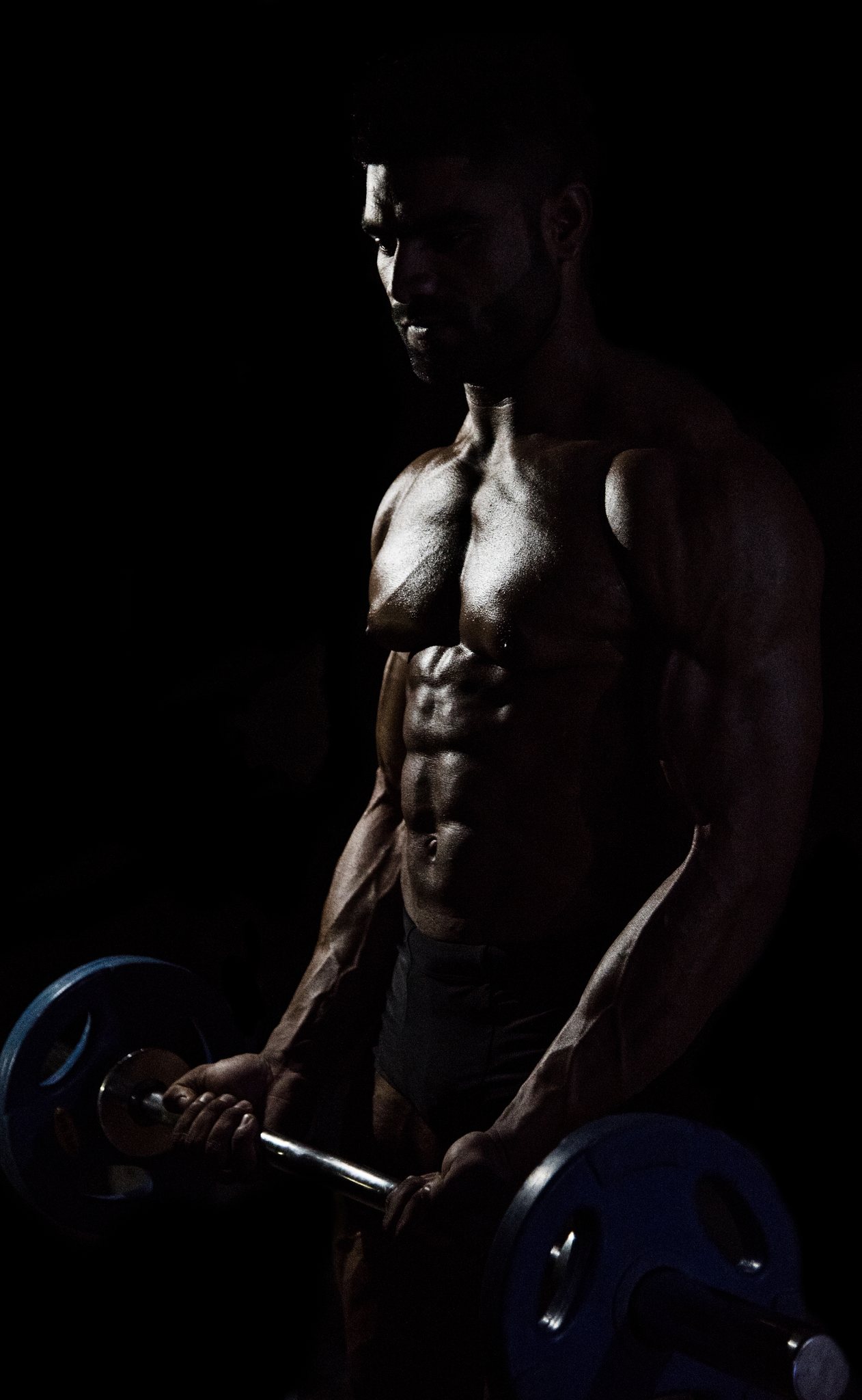 Low-Key Muscular Framing